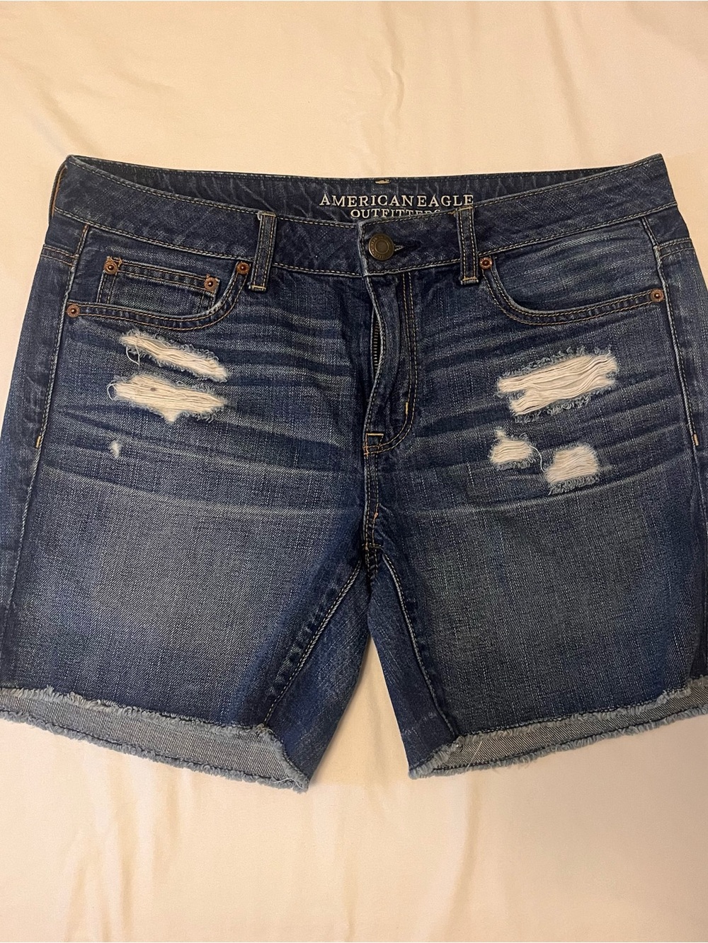 Women’s size 8 American Eagle Mid-Rise Distressed Denim Shorts - Blue